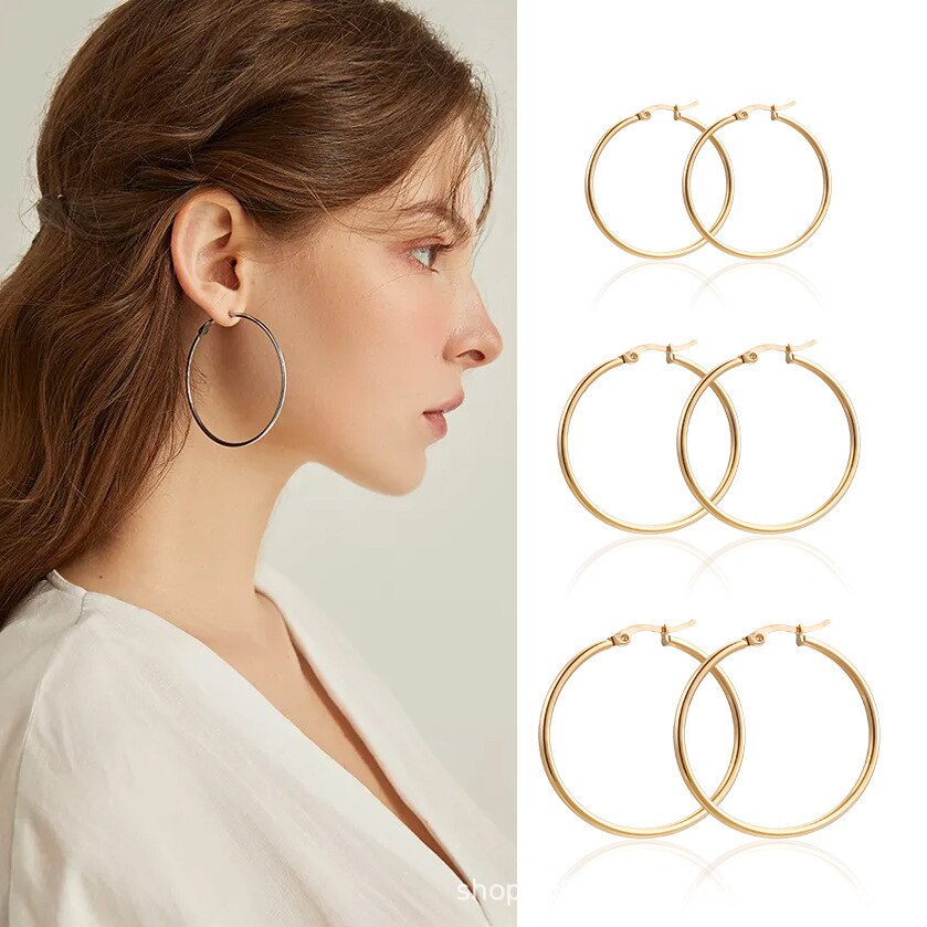Argollas trenzadas Stainless Steel color Gold acero inoxidable Aretes Mujer